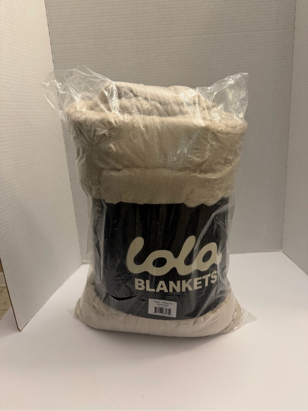 Lola Blankets Faux Fur Throw Blanket in Cream